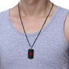 Black and silver personalised medical id alert. A dog tag style necklace worn by a man in grey vest top.