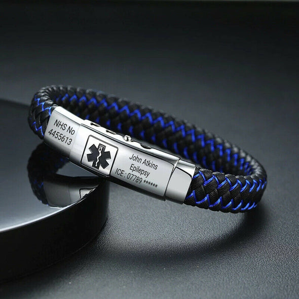 Black and blue plaited microfibre leather medical alert bracelet with stainless steel adjustable tag showing a personalised engraving