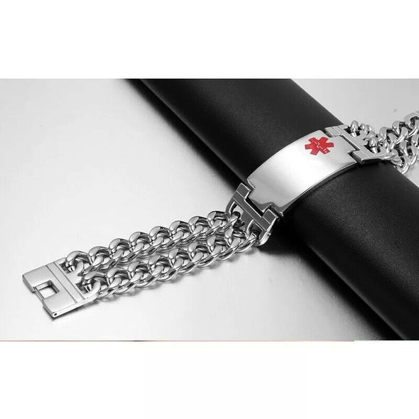 Banks wide stainless steel medical alert bracelet laid across a black display rod.