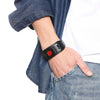 Houston wide black leather medical ID bracelet worn on a male model in denim and white shirt.