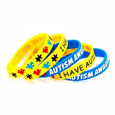 Yellow and Blue Silicone Wristbands with wording I have Autism and Autism Awareness.