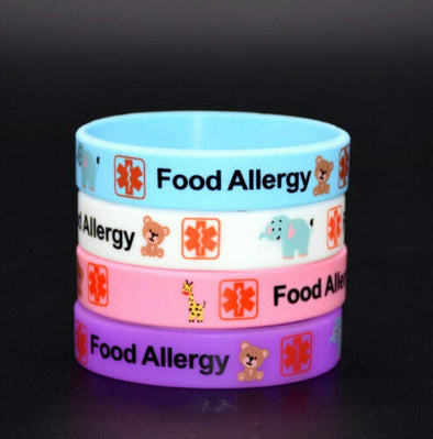 Kids range of Food Allergy medical alert silicone wristbands with animal characters in blue, white, pink and purple.