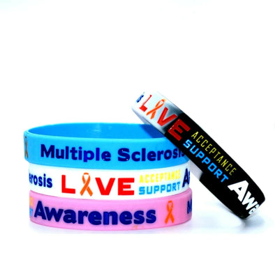 Multiple Sclerosis medical alert and awareness silicone wristbands in black, white, blue and pink.