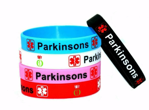 Parkinsons medical alert and awareness silicone wristbands in black, blue, white, pink and red.