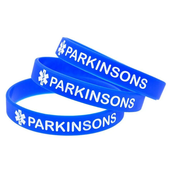 Parkinsons awareness silicone wristbands in blue with white text.