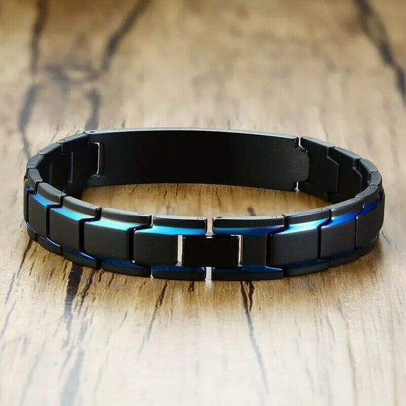 Ripley medical alert bracelet in black with petrol blue accents down the strap, showing the closed clasp view.