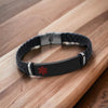 Customisable Savannah faux leather and stainless steel medical alert bracelet with red symbol on wooden table