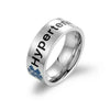 Silver stainless steel Hypertension medical alert ring with blue Staff of Asclepius symbol.