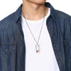 Spectra stainless steel medical alert necklace showing the front of the pendant with red medical symbol worn by a male model in a white shirt.