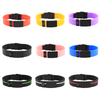 Sports Plus+ silicone and stainless steel medical alert bracelets in red, yellow, purple, black, pink, blue, green stripe, white stripe and red stripe.