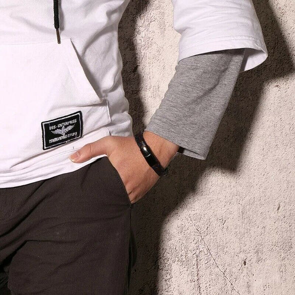 Customisable Wave leather and black stainless steel medical alert bracelet worn by a male model